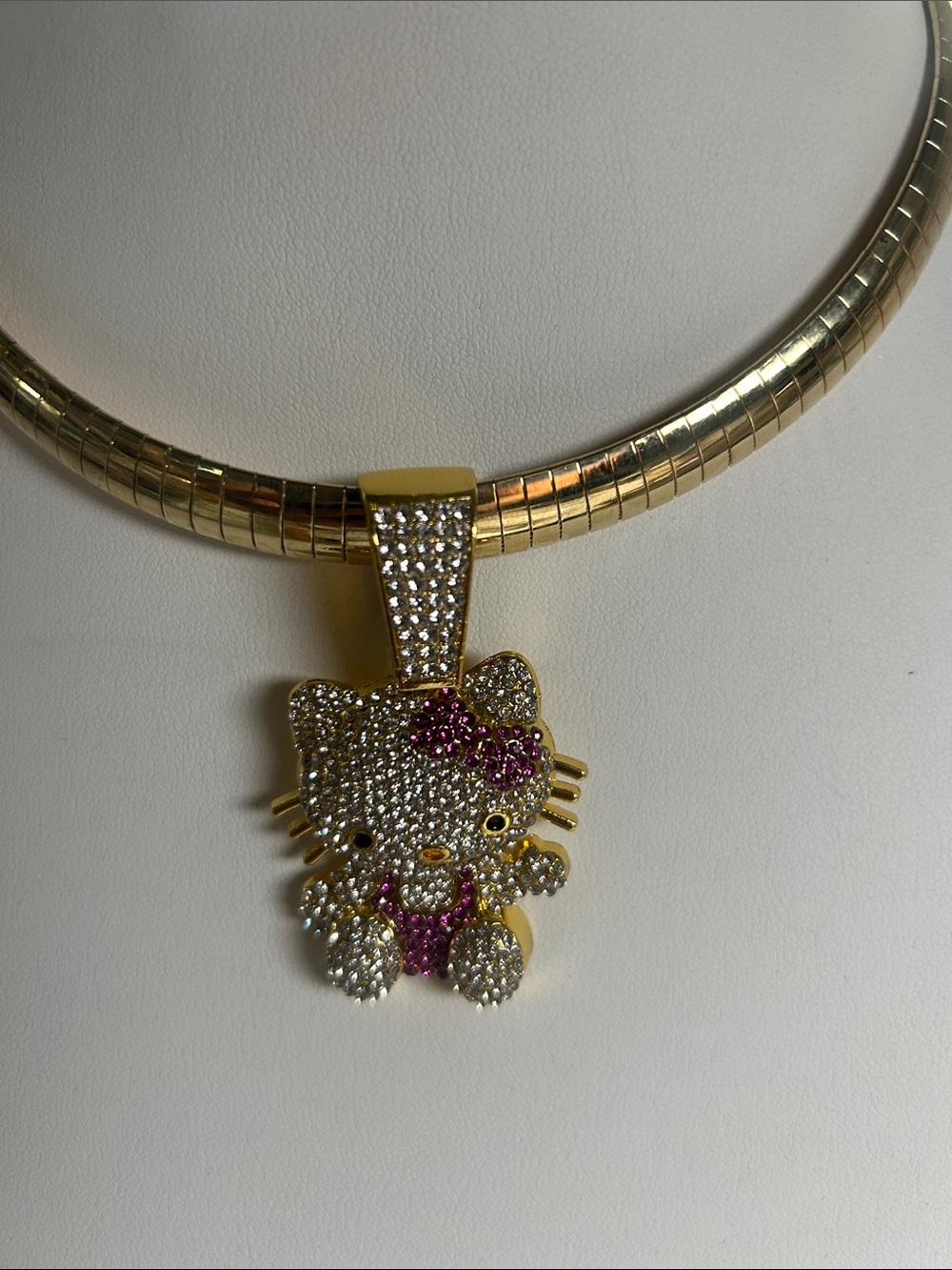Gold-Tone Rhinestone Kitty Pendant Necklace with Pink Accents